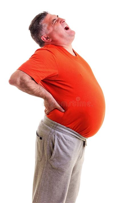 Overweight man bending over Stock Photos and Images